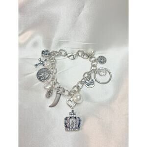 Silver‑Tone Charm Bracelet with Crown, Cross & Crystal Accents